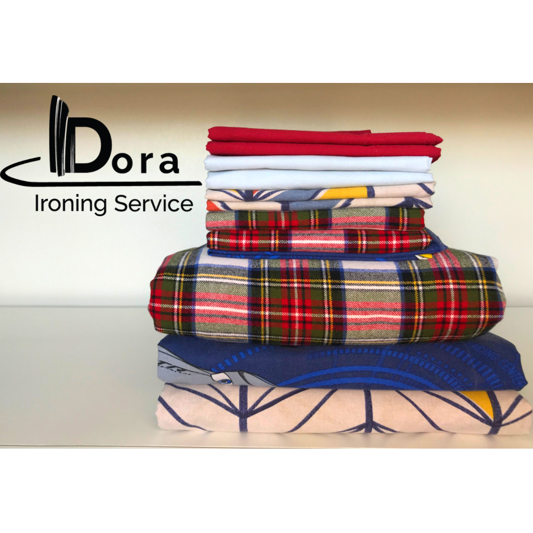 Ironed and folded bedding from the Dora Ironing Service wash and iron service