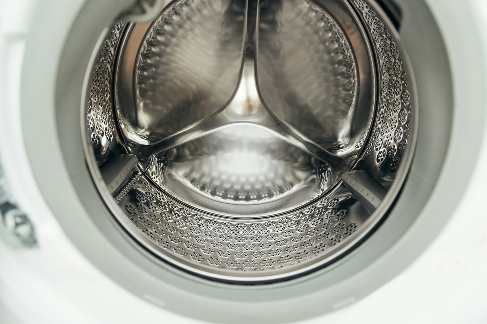 Inside of a washing machine drum - Dora Ironing Service